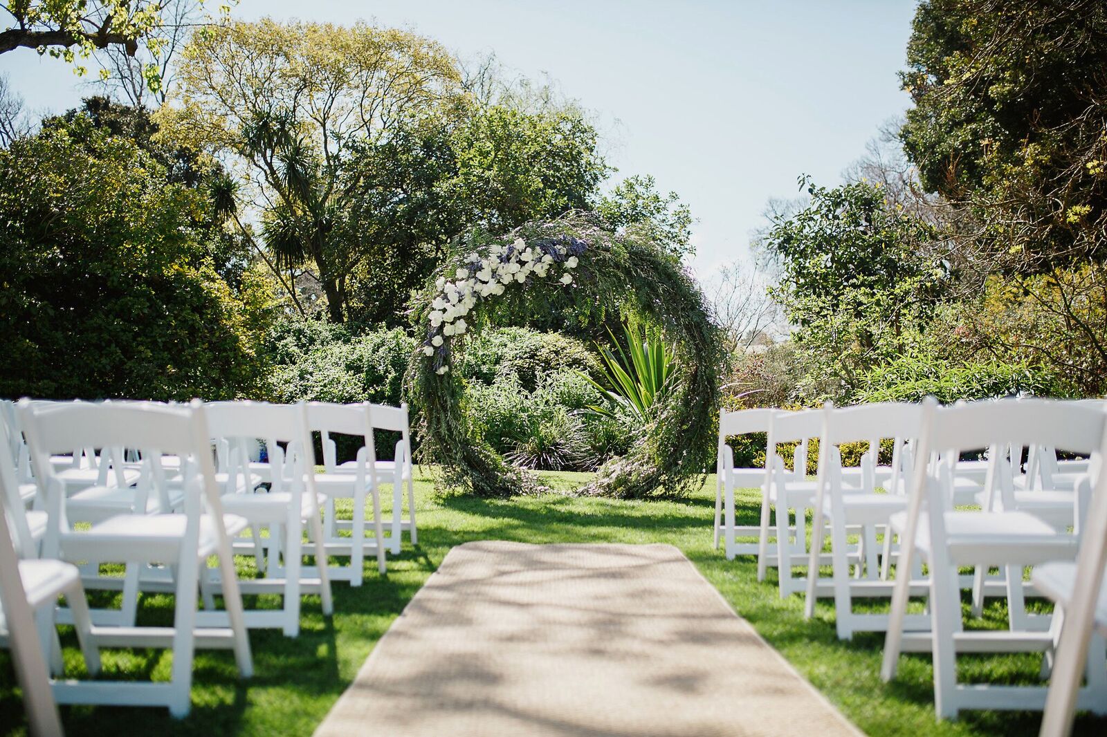 Garden wedding venue with arch of flowers